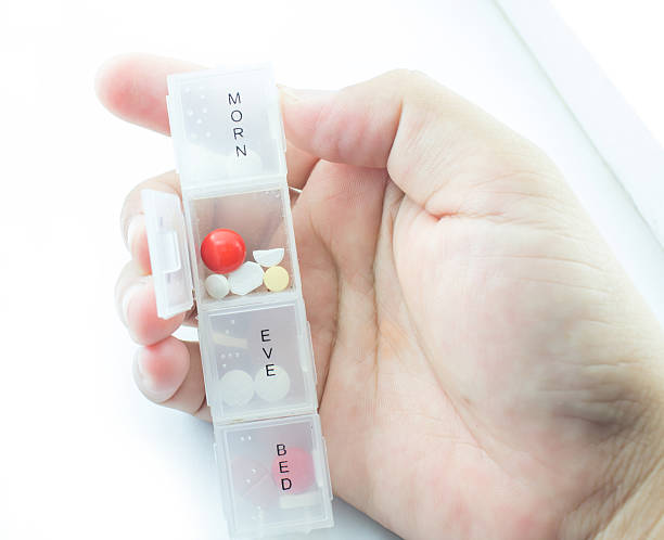 Medicine in pill box . stock photo