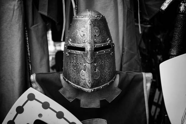 Medieval armor helmet Ancient medieval metal armor helmet, war and champion armored clothing stock pictures, royalty-free photos & images