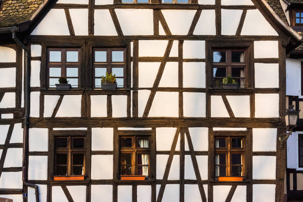 Medieval european house facade Facade of an old medieval half-timbered house in Strasbourg, France half timbered stock pictures, royalty-free photos & images