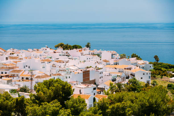 Mediterranean architecture - white color houses in Nerja, Spain Mediterranean architecture - white color houses in Nerja, Malaga Province, Andalusia, Spain nerja stock pictures, royalty-free photos & images