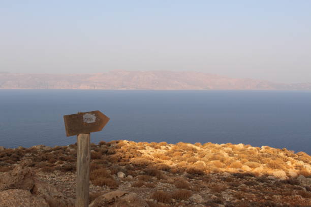 Mediterranean Sea view with the rough terrain in Crete Island, Greece. stock photo