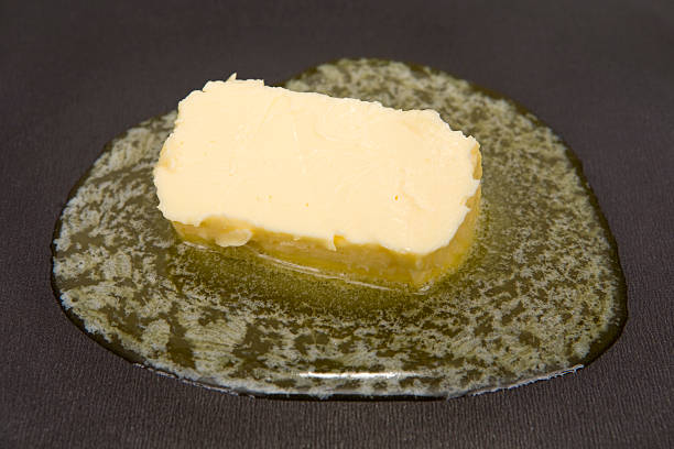 Melting butter stock photo