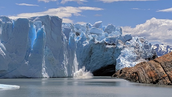 Perito Moreno glacier arch forming as the sun and the water of Brazo Rico eat away at the ice. Los Glaciares National Park, Patagonia, Argentina.