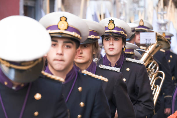 Members of a band of bugles and drums accompanying a Holy Week procession. Traditional holidays. Easter in Spain stock photo