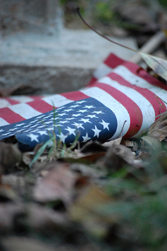 A U.S. flag placed on a soldier's grave.