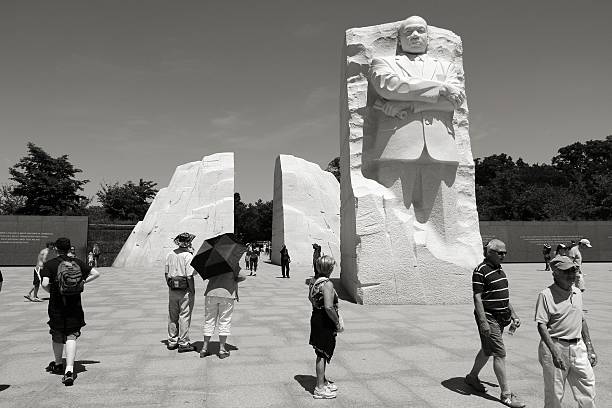 MLK memorial Washington, United States - June 15, 2013: People visit Martin Luther King memorial on June 15, 2013 in Washington. 18.9 million tourists visited capital of the United States in 2012. mlk memorial stock pictures, royalty-free photos & images