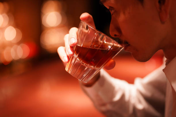 Men drinking alcohol at the bar stock photo