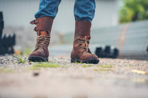 Tieing Work Boot Stock Photos, Pictures & Royalty-Free Images - iStock