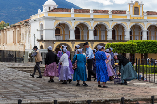 antigua guatemala, sacatepequez, Guatemala ; 01-04-2022 : Mennonites tourist taking pictures in front of the cathedral of Antigua Guatemala