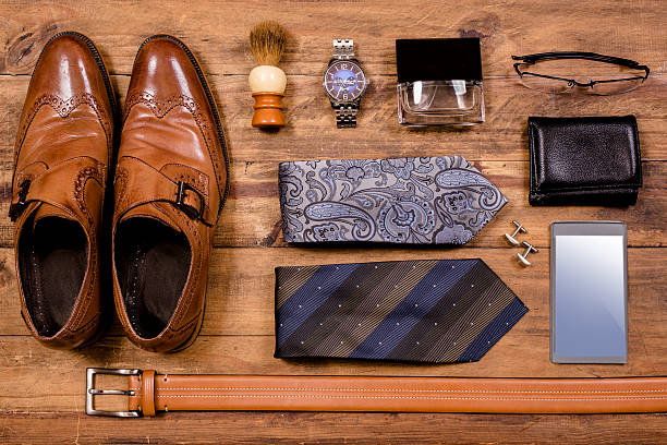 men's accessories organized on table in knolling arrangement - business man shoes on desk imagens e fotografias de stock