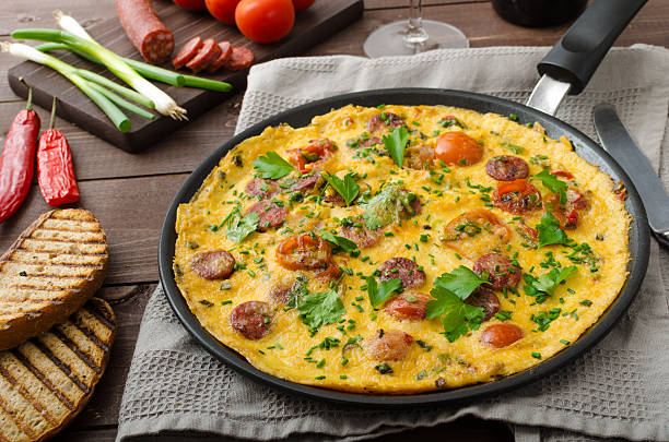 mens omelette with chorizo - chorizo stockfoto's en -beelden