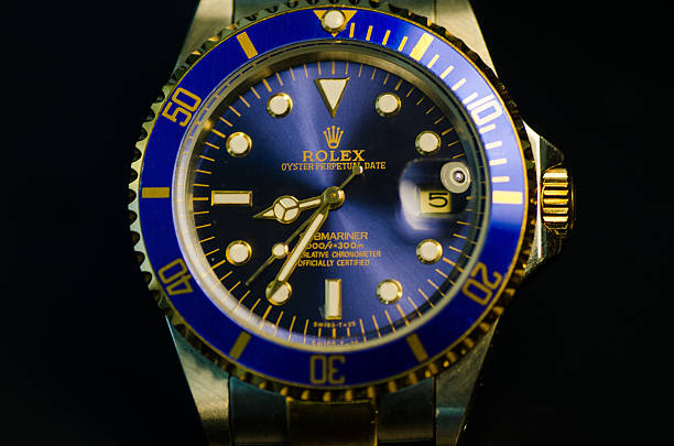 Men's Rolex Submariner Saint Helens, Oregon, USA - September 30, 2012: Rolex Submariner close-up. brand name stock pictures, royalty-free photos & images