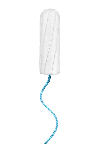 menstrual tampon close-up isolated on a white background - tampons stockfoto's en -beelden