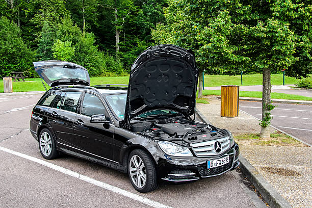 Mercedes-Benz W204 C180 Rhone-Alpes, France - August 7, 2014: Motor car Mercedes-Benz W204 C180 is parked at the parking near the interurban freeway. mercedes benz stock pictures, royalty-free photos & images
