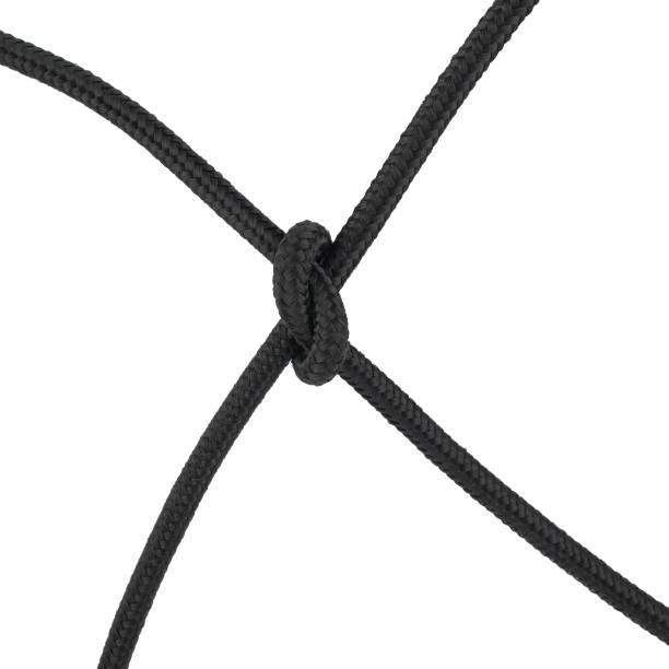 mesh of black braided rope isolated on white background stock photo