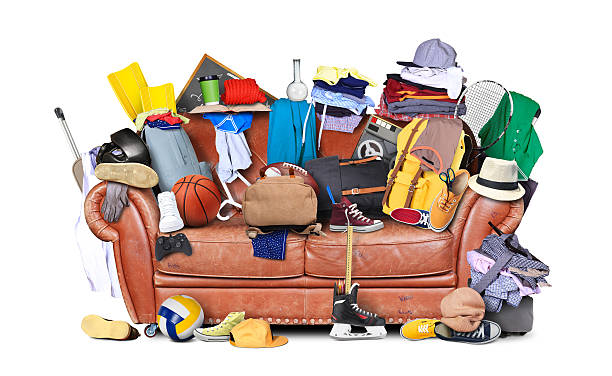 Mess Large leather sofa with a bunch of different things manufactured object stock pictures, royalty-free photos & images