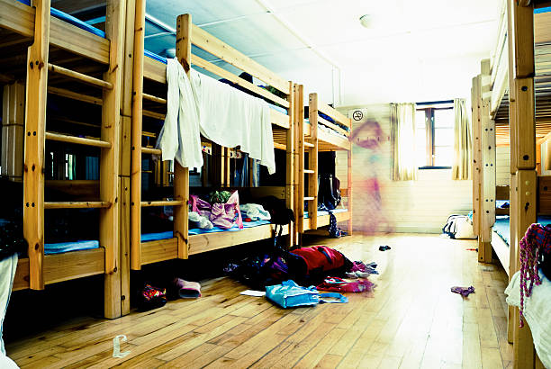 Messy dorm room with a blurred motion child stock photo