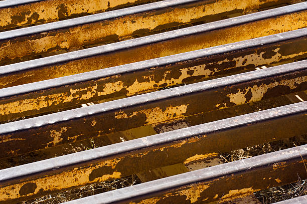 Metal Cattle Guard Closeup Detail Metal Cattle Guard Closeup Detail.  Rows and line of metal grate used to deter cattle from crossing roads.  Converted from 14-bit Raw file.  sRGB color space. cattle grid stock pictures, royalty-free photos & images