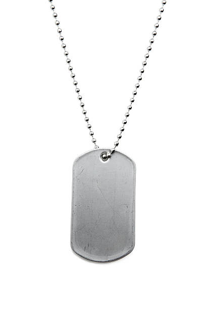 A metal dogtag on silver color stock photo