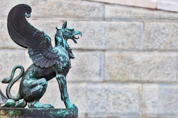 Metal griffin statue stock photo