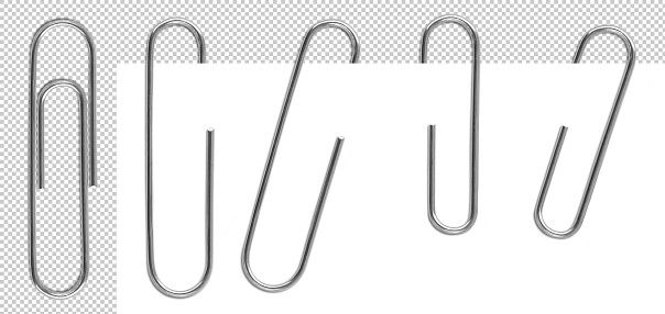 Classic metal paper clips isolated and attached to paper in different way.