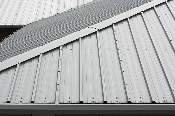A metal roof that has a small slant to it  stock photo