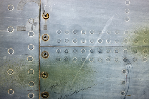 airplane metal texture with screws and rivets