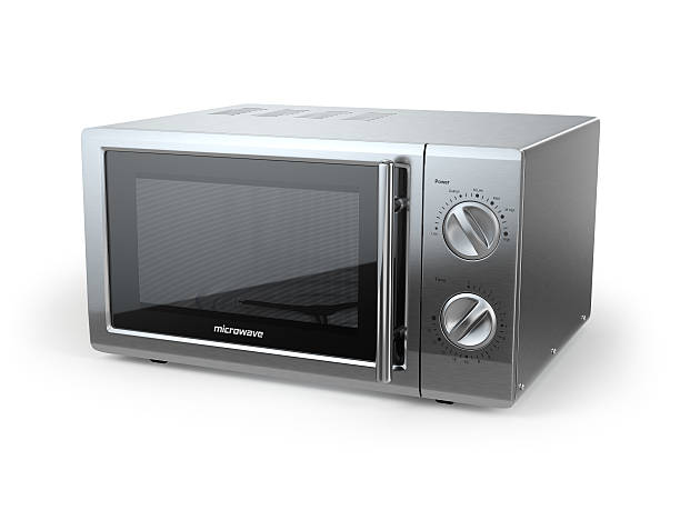 Metallic microwave oven isolated on white background. Metallic microwave oven isolated on white background. 3d microwave stock pictures, royalty-free photos & images