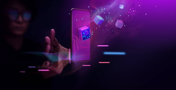 Metaverse and Blockchain Technology Concepts. Person with an Experiences of Metaverse Virtual World via Smart Phone stock photo