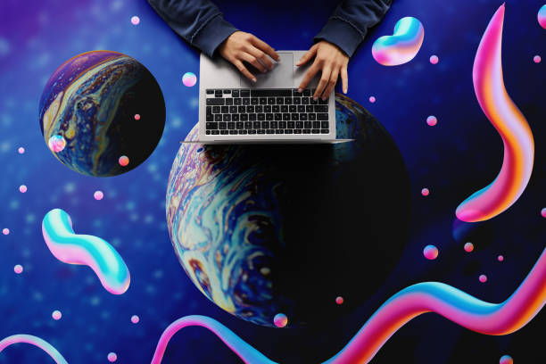 Metaverse concept.Woman using laptop with planet screen stock photo