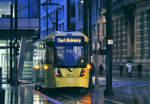 Metrolink Light rail and yellow tram in Manchester in UK stock photo