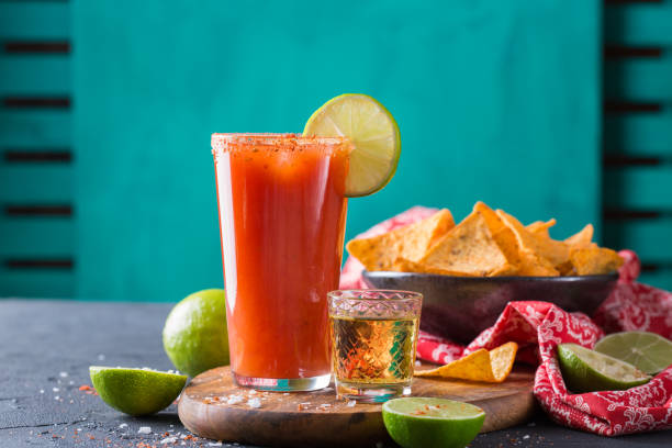 Mexican alcohol cocktail Chavela served with tequila shot stock photo