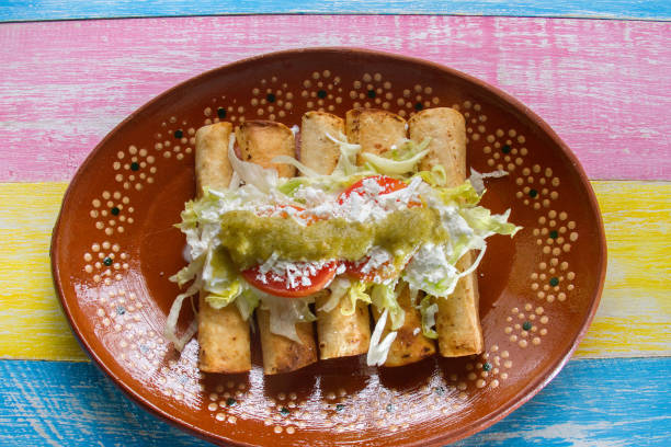 Flautas Vs Taquitos Stock Photos, Pictures & Royalty-Free Images - iStock