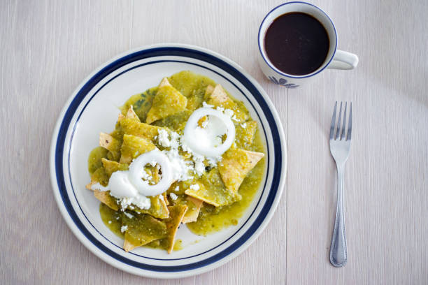 Mexican food, green chilaquiles stock photo