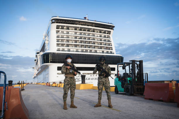 Mexican marines providing security at the cruise ship port in Mahahual, Mexico stock photo