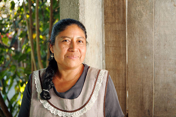 Mexico, Oaxaca, Portrait of mature woman wearing apron  mexican woman stock pictures, royalty-free photos & images