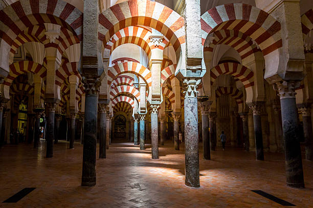Mezquita Mosque Cathedral Cordoba Spain Interior of The Cathedral and former Great Mosque of Cordoba - La Mezquita cordoba mosque stock pictures, royalty-free photos & images