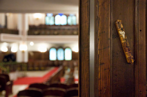 Mezuzah Mezuzah affixed to the doorpost of Neve Shalom Synagogue in Istanbul synagogue stock pictures, royalty-free photos & images