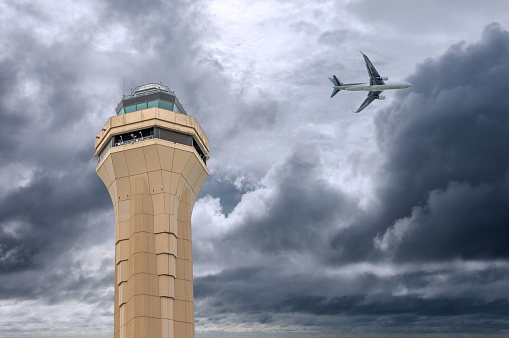 Miami air traffic control tower in stormy day.