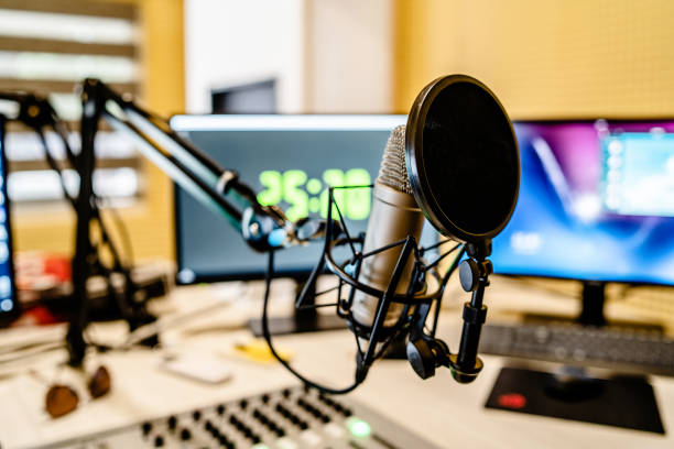 Microphone and mixer at the radio station studio broadcasting news stock photo