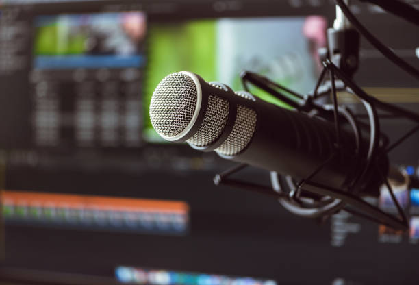 Microphone on the background of the computer monitor. Microphone on the background of the computer monitor. podcasting stock pictures, royalty-free photos & images