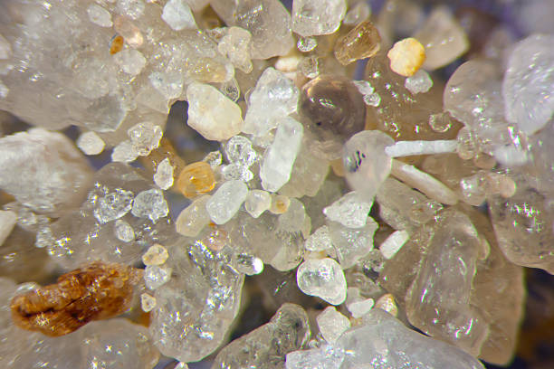 Microphotography of sand grains stock photo