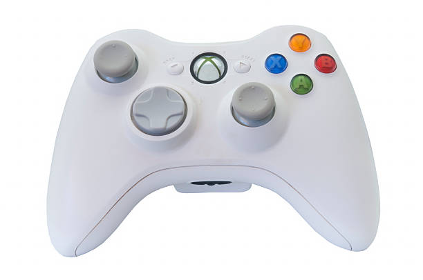 Microsoft Xbox 360 Controller Adelaide, Australia - January 30, 2015: A studio shot of a Microsoft Xbox 360 video game controller. A popular video game entertainment system sold worldwide since 2005. Microsoft have sold over 80 million consoles worldwide making one of the top ten selling video game consoles in history. xbox stock pictures, royalty-free photos & images