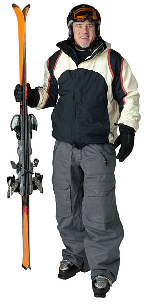 Mid 40's skier on white stock photo