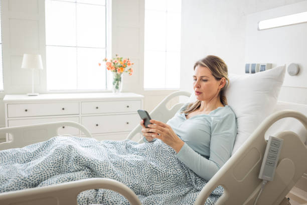 Mid adult woman in hospital. stock photo