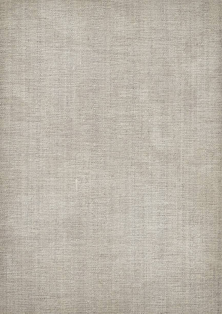 Mid gray linen textured fabric with visible weave stock photo