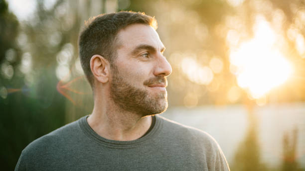 Middle age man portrait Middle age man portrait at sunset side view photos stock pictures, royalty-free photos & images