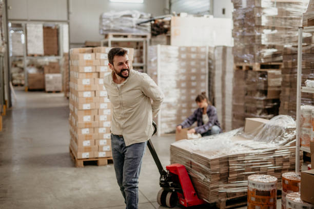 Middle class workers in the warehouse stock photo