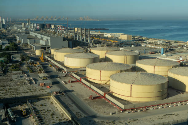 Middle East water and gas containers along the coastline for gas, water and oil concepts. Industrial zone. stock photo