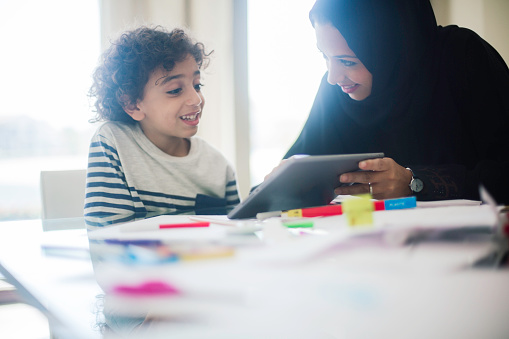 middle eastern mother helping her child with homework picture id586177148?b=1&k=20&m=586177148&s=170667a&w=0&h=tz4R 9hoMopJCq5uX